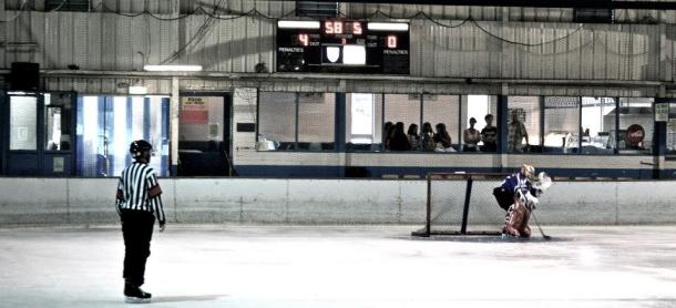 A huge Oakleigh crowd watches the dying seconds of the Ceptors' win; Jay Hellis in perfect pose, mid shut-out. (Pic: Elizabeth Vine)