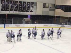 The many Ice players still standing at the end of the game salute the crowd.