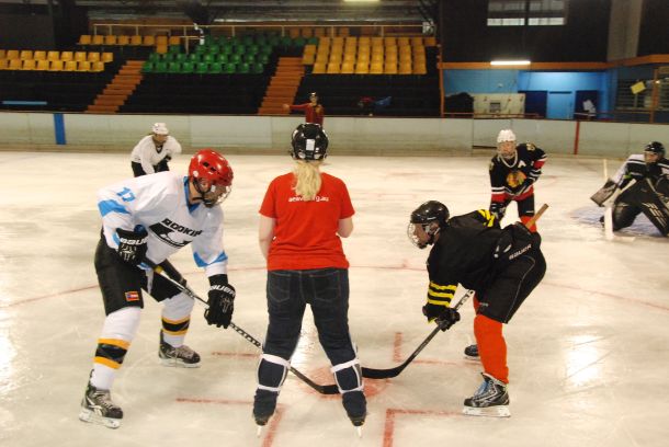 My first ice-time of 2014: facing Brendan Parssons in a face-off with his girlfriend, Lex, dropping the puck. Life's a loaded deck, folks, but that doesn't mean it can't be fun. Pic: Big Cat.