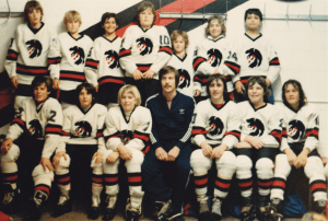 1980 Blackhawks, featuring Will Brodie. You can tell they're hockey players because nobody is looking at the right camera.